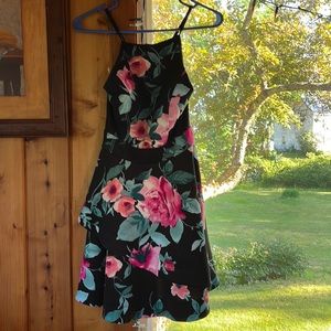 Homecoming is soon! Black and  flowered short dress.  Beautiful dress EUC